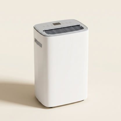 DryHaven 52-pint dehumidifier, front three-quarter studio view on warm cream background